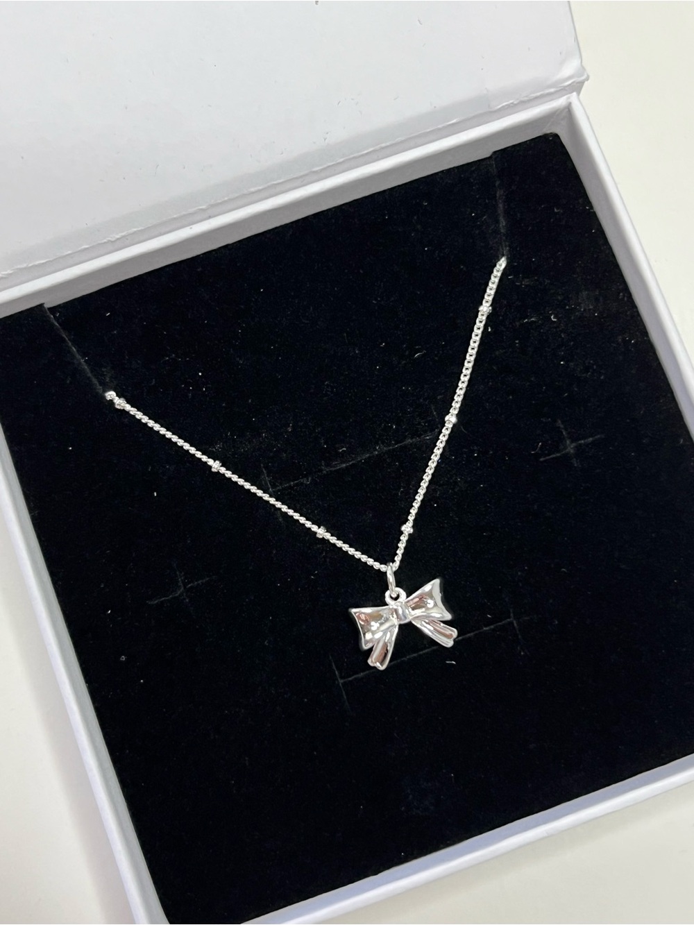 Sterling Silver Bow Pendant Necklace - Classic Women's Jewelry